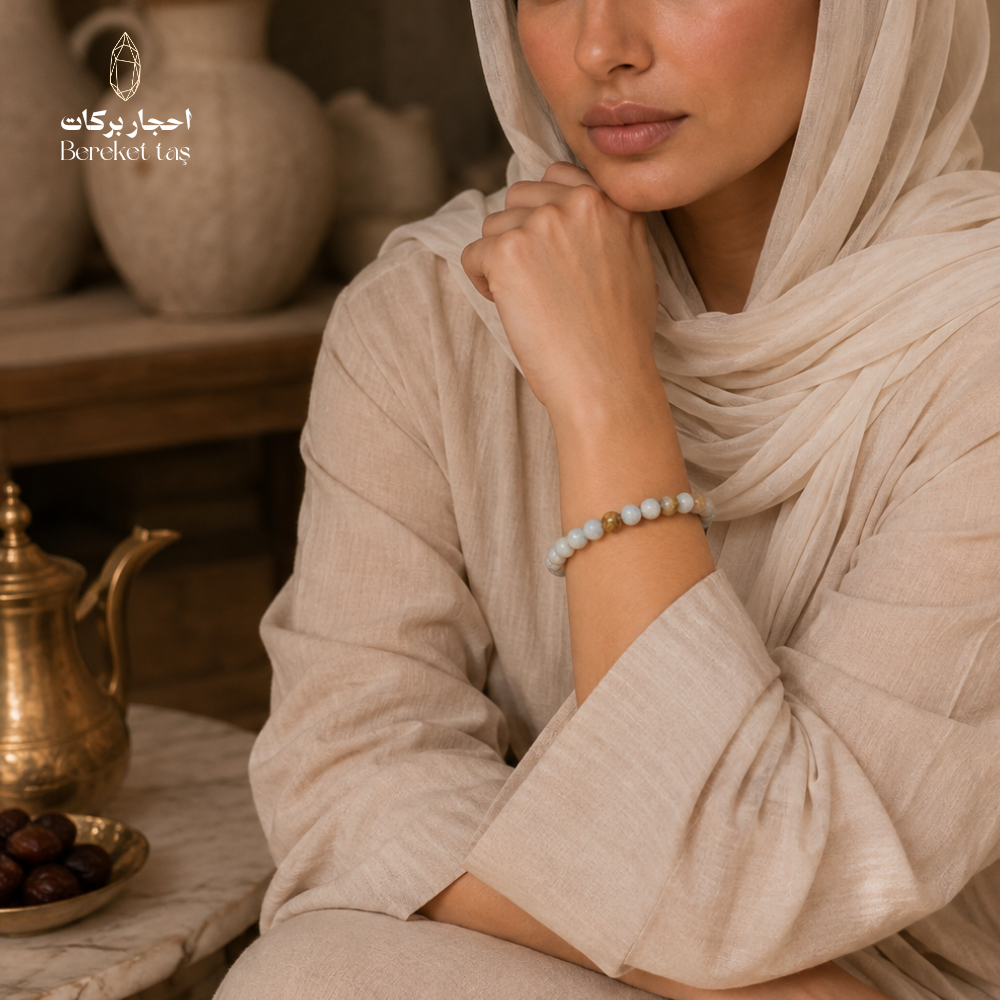 Celestite stone bracelet with 7 mm beads and 16 cm total length, worn on the wrist with a modest beige outfit, sourced from Madagascar