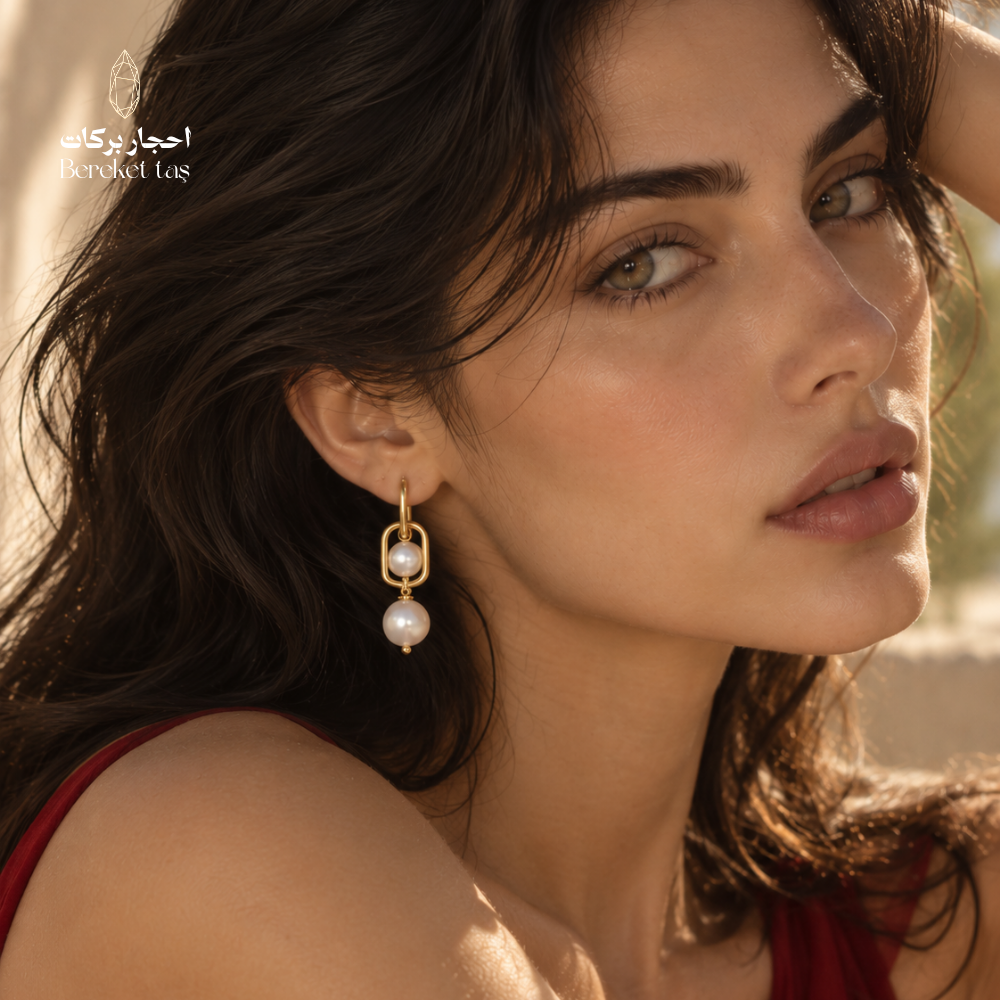 Elegant model wearing natural Pearl drop earrings with gold-plated copper, highlighting the refined handcrafted jewelry design