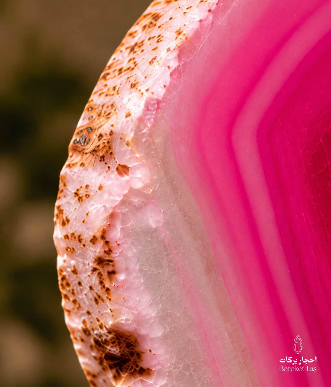 Close-up detail of Brazilian pink agate showing natural layers and mineral inclusions