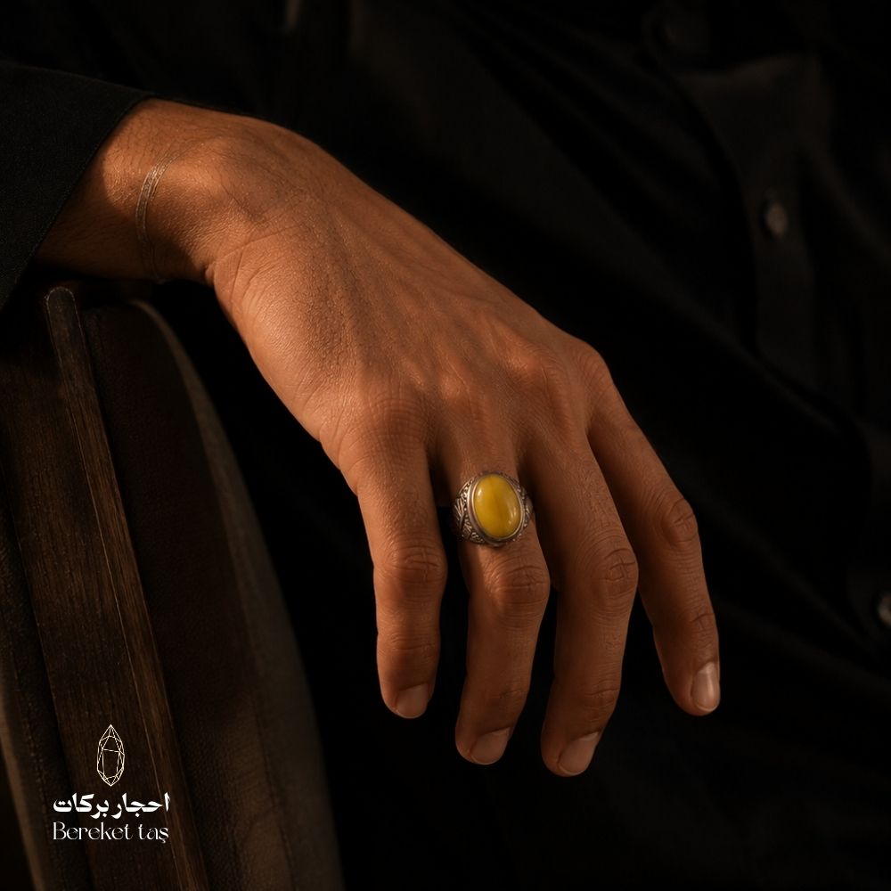 Natural yellow amber ring in 925 sterling silver, styled in an elegant men’s look.