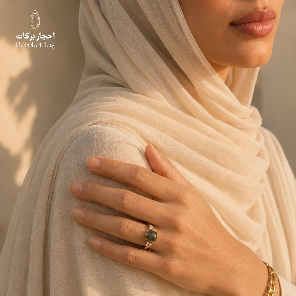 Natural Labradorite ring (Peacock Stone) with gray-green tones, worn on hand with a beige scarf