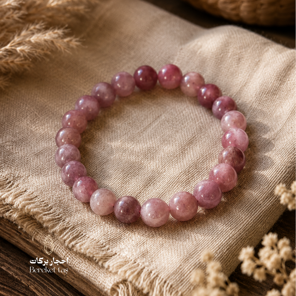 Natural ruby beaded bracelet featuring pink-purple 9 mm gemstone beads