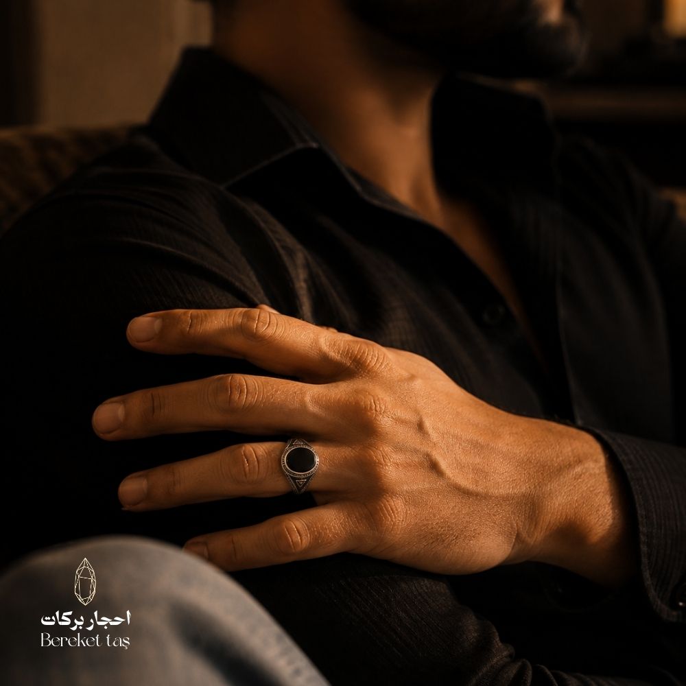 Luxury men’s Onyx stone ring in 925 sterling silver, worn on hand with an elegant black outfit — Bereket Taş