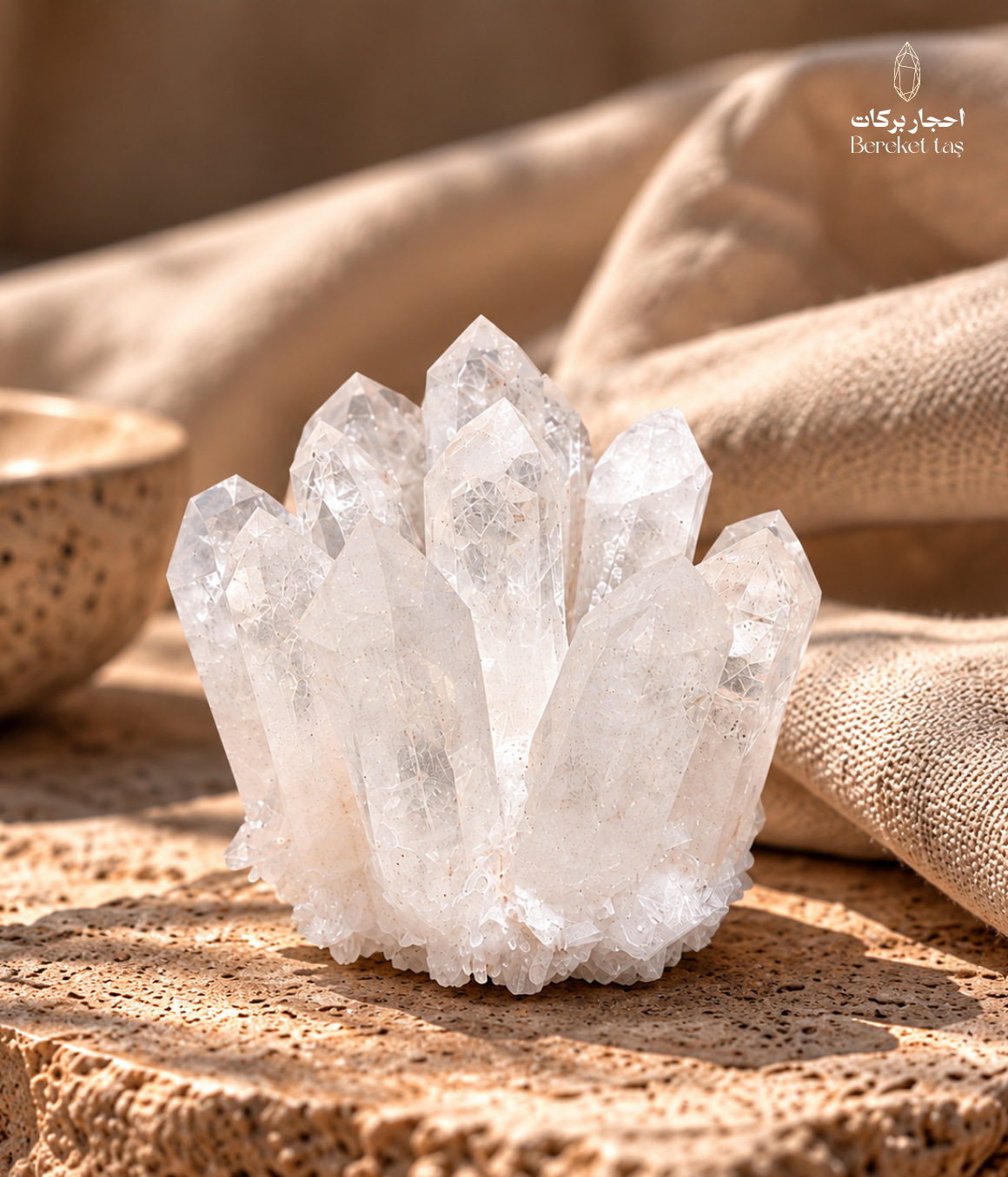 Natural Brazilian crystal quartz cluster displayed on a stone surface