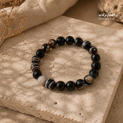 Eye Agate stone bracelet in black and natural brown tones with unique natural patterns, 8 mm beads