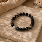 Eye Agate stone bracelet in black and natural brown tones with unique natural patterns, 8 mm beads
