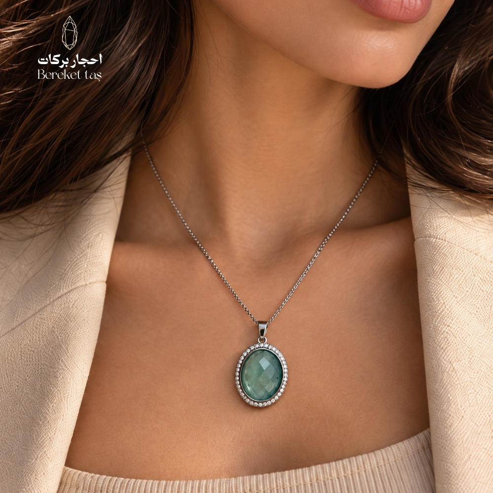 Natural green Fluorite pendant necklace with a silver chain shown in a close-up elegant look