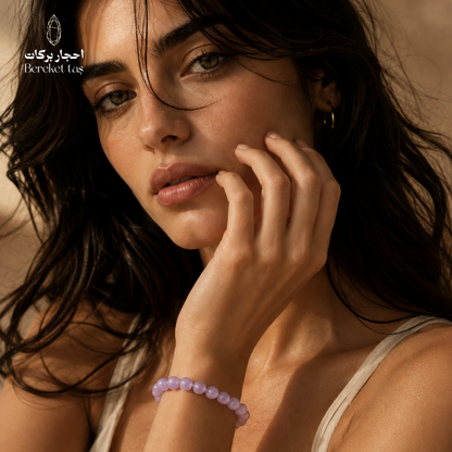 Natural Kunzite gemstone bracelet with soft pink and purple beads worn on the wrist