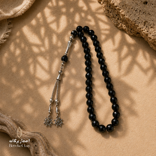 Natural black onyx tasbih with 10 mm beads and an elegant design by Bereket Taş