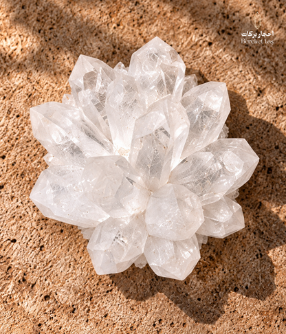 Natural Brazilian crystal quartz cluster viewed from above with multiple clear crystal points