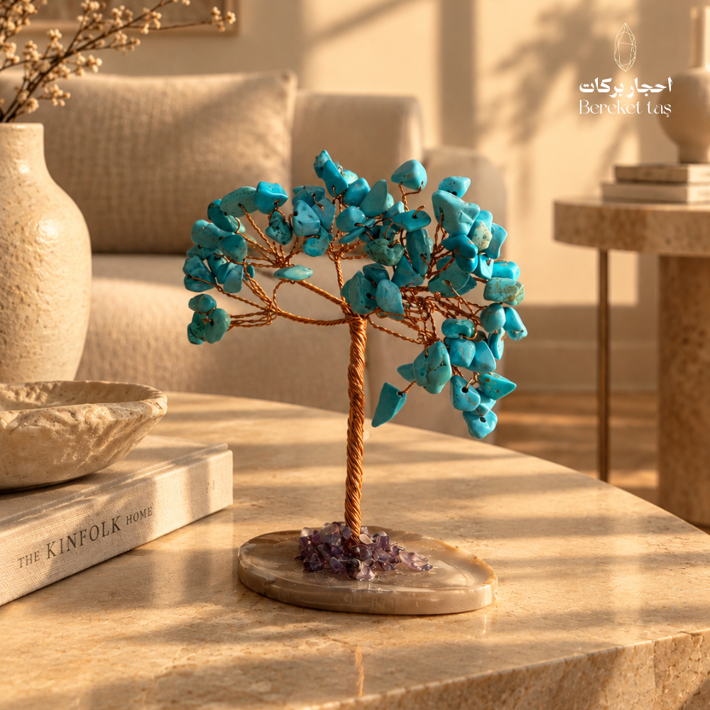 Natural Iranian Turquoise tree with an Agate stone base displayed on a marble table in a warm interior