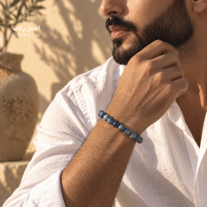 Natural Kyanite bracelet with deep blue gemstone beads styled on a man's wrist