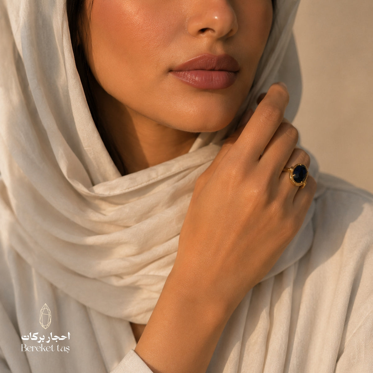 Natural Lapis Lazuli ring with deep blue gemstone and gold-plated setting worn with a white hijab