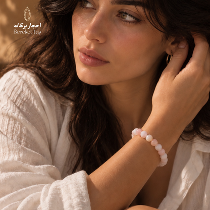 Natural Morganite stone bracelet with soft pink and white gemstone beads worn elegantly on the wrist.