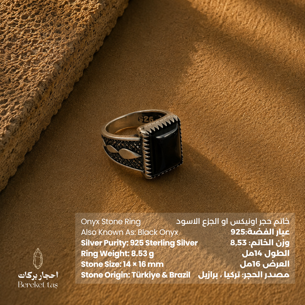 Natural black Onyx ring in 925 Sterling Silver photographed on desert sand