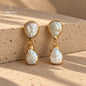 Natural Pearl drop earrings with irregular shapes and gold-plated metal accents