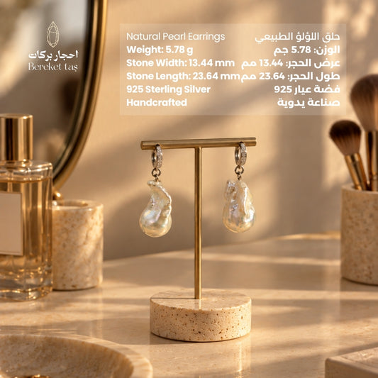 Natural Pearl drop earrings with 925 sterling silver, displayed on a jewelry stand with product details