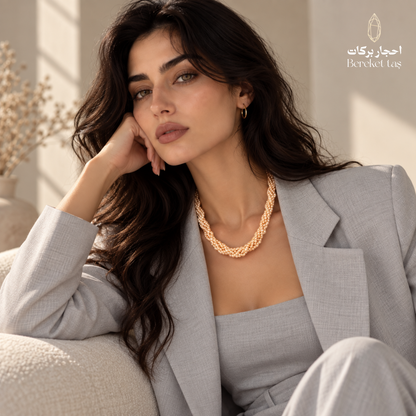 Natural Pearl handmade necklace styled with an elegant gray outfit, highlighting its refined multi-strand design