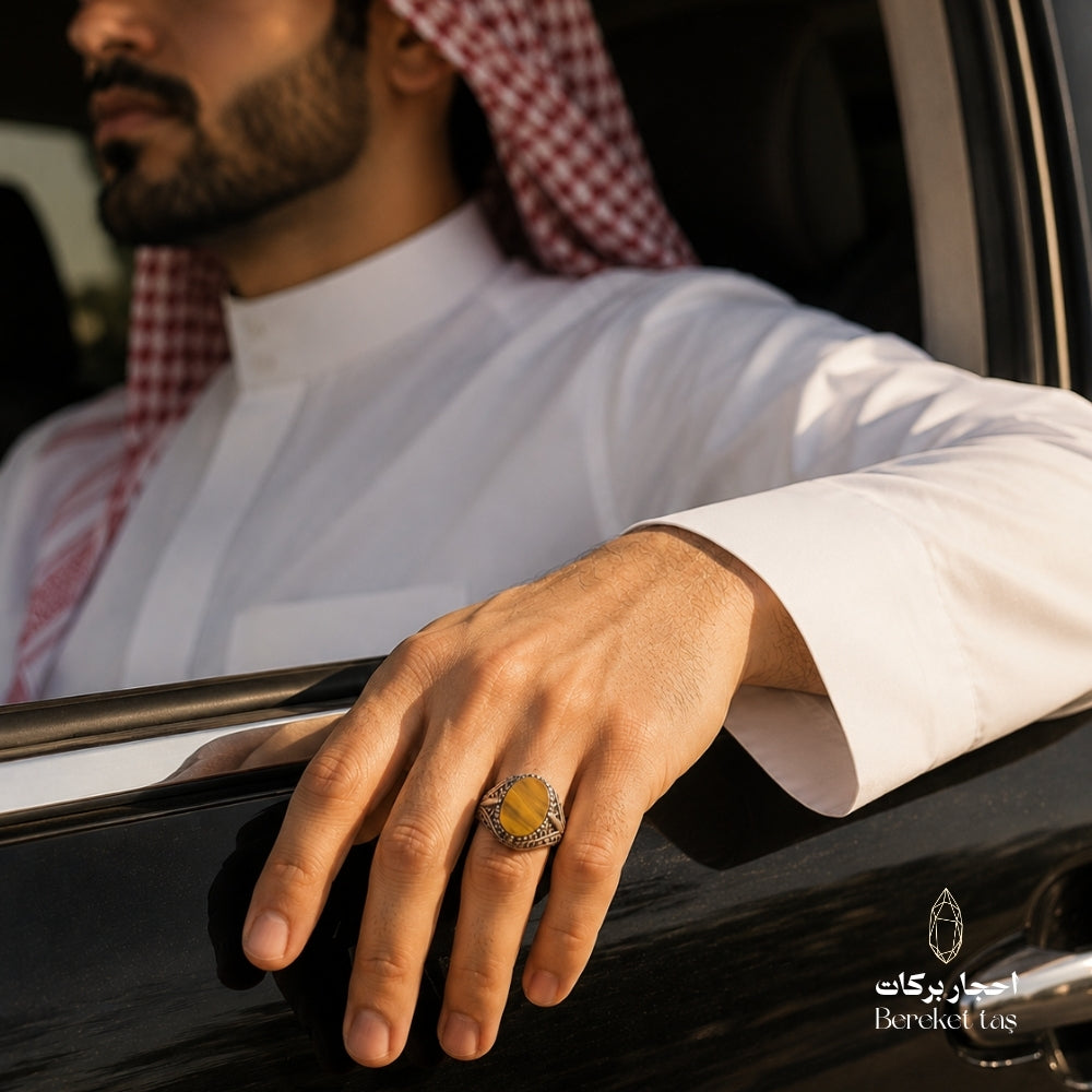 Natural Tiger Eye ring with honey brown stone and 925 silver, worn by a man