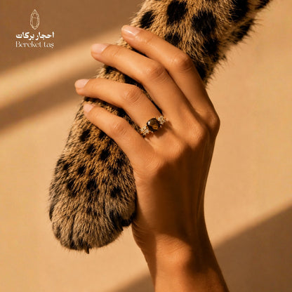 Natural Tiger Eye ring with rich brown stone and honey-colored reflections worn on hand