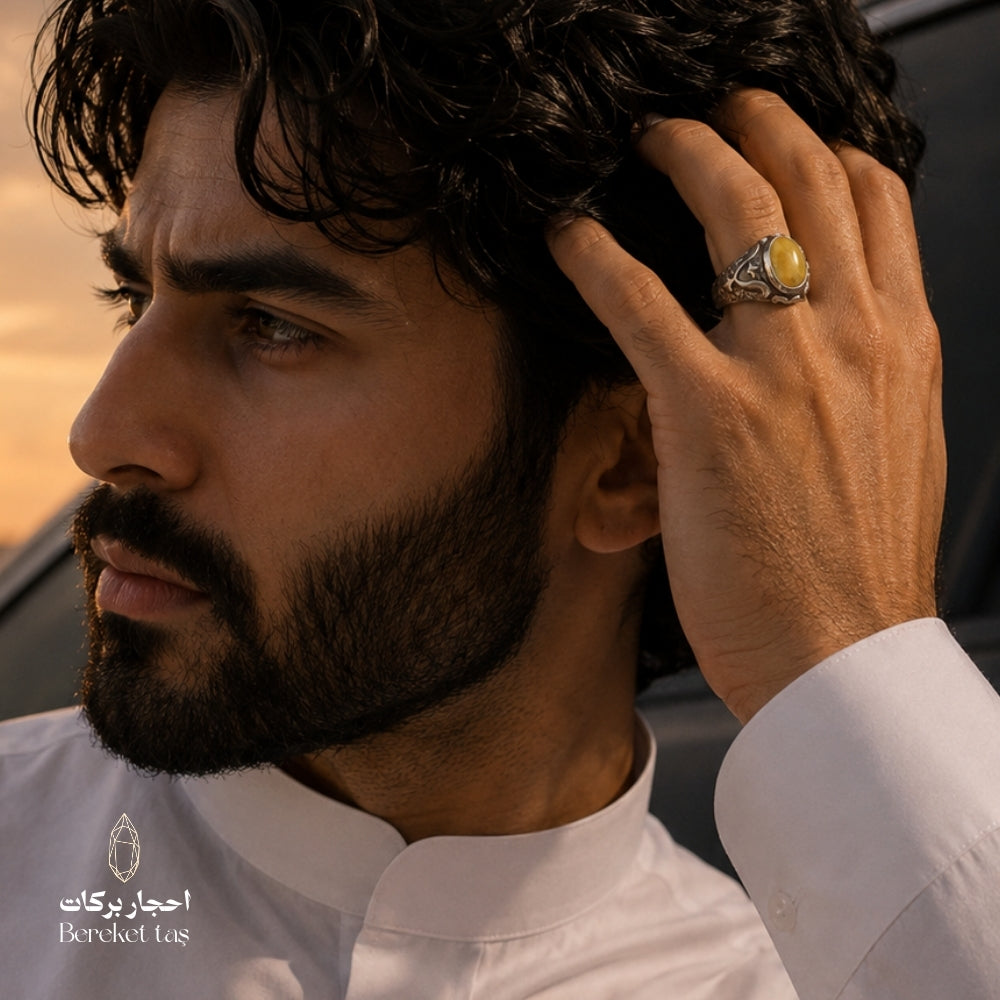 Natural yellow amber ring in 925 sterling silver worn on hand