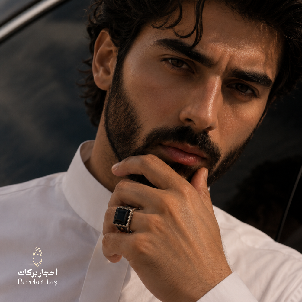 Man wearing a black Onyx gemstone ring in 925 Sterling Silver