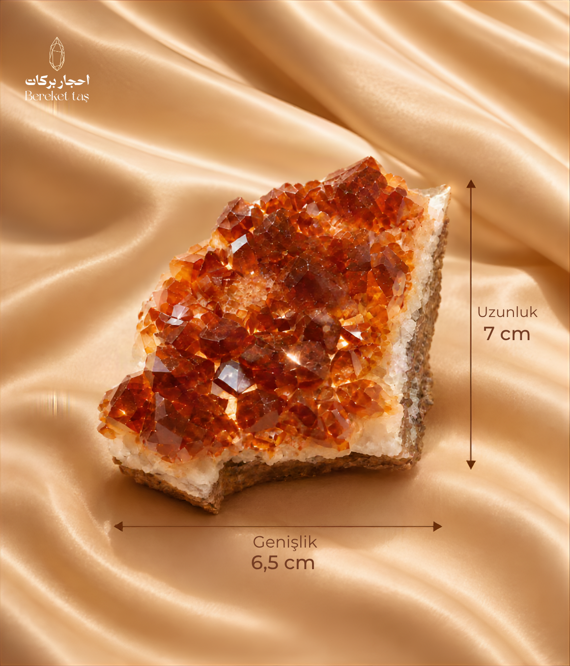 Natural raw Citrine crystal cluster showing its 7 cm length and 6.5 cm width against a warm satin background