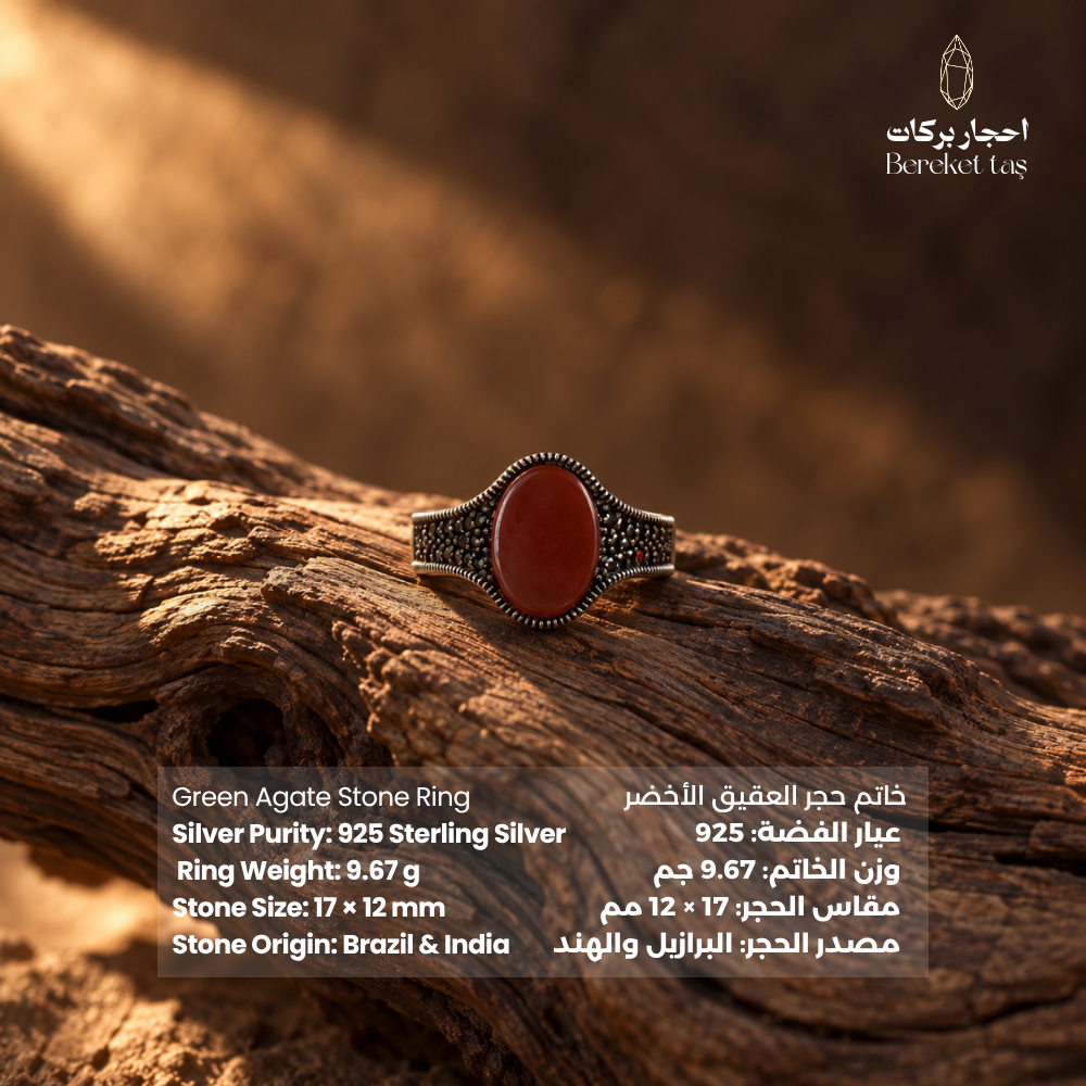 Natural Red Agate ring in 925 Sterling Silver displayed on textured wood, featuring an oval red gemstone and intricate silver detailing.