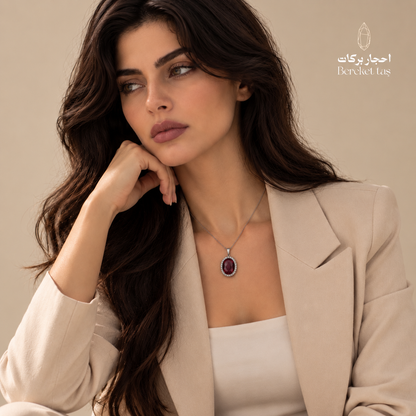 Natural red Quartz pendant necklace worn with an elegant beige outfit