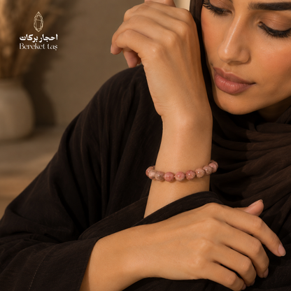 Pink Rhodochrosite stone bracelet worn on the wrist with 8 mm beads