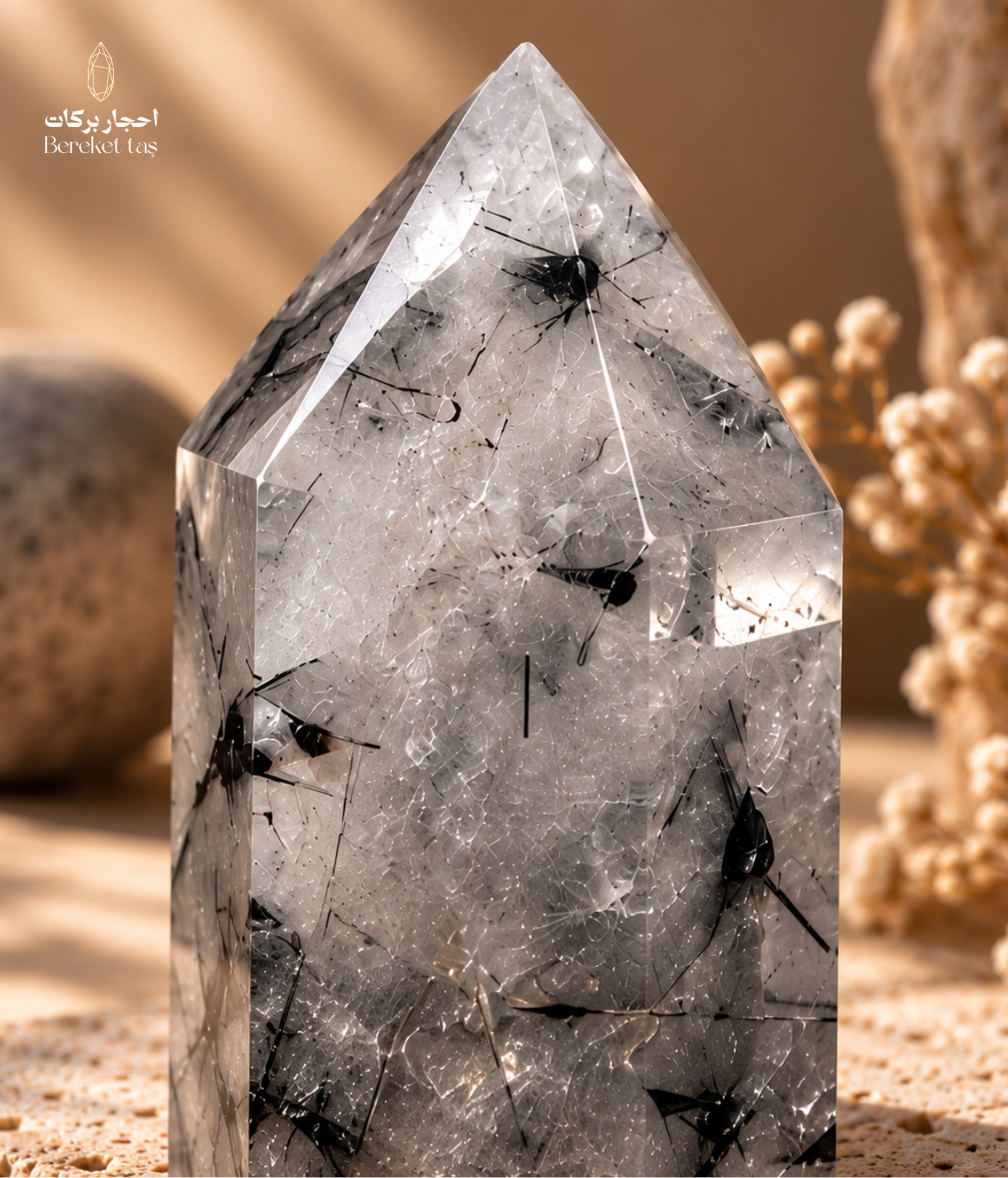 Close-up of natural tourmalinated quartz with black tourmaline inclusions and clear crystal structure